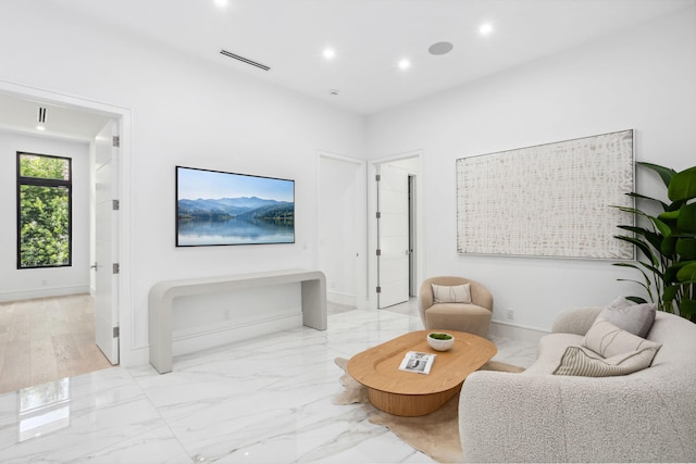 living room with light hardwood / wood-style floors