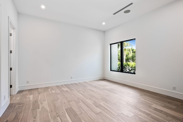 empty room featuring light hardwood / wood-style floors