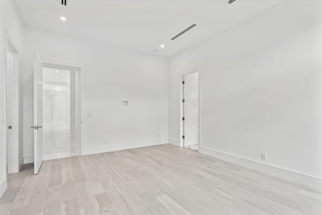 empty room with light wood-type flooring