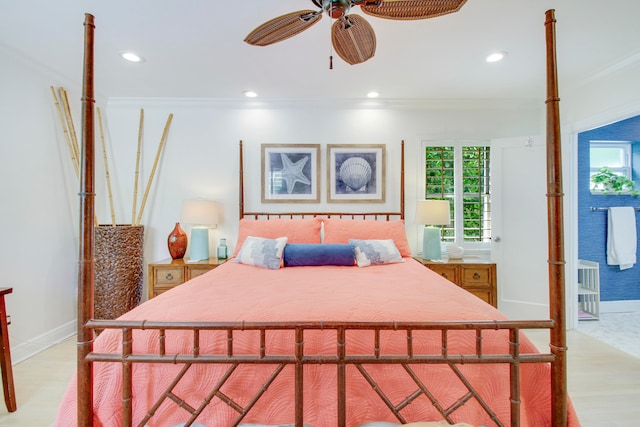 bedroom with ceiling fan, light hardwood / wood-style floors, and crown molding