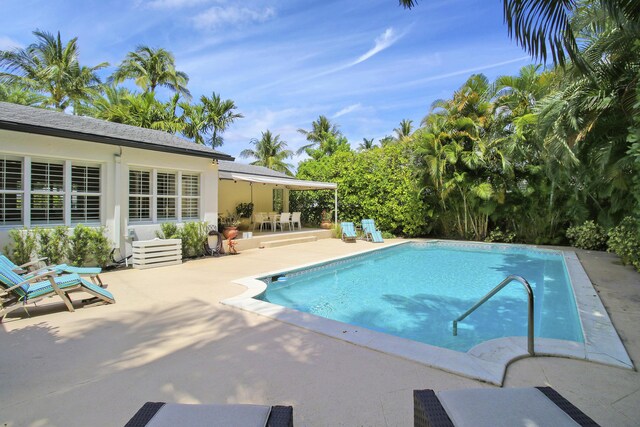 view of pool featuring a patio area