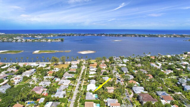 drone / aerial view featuring a water view