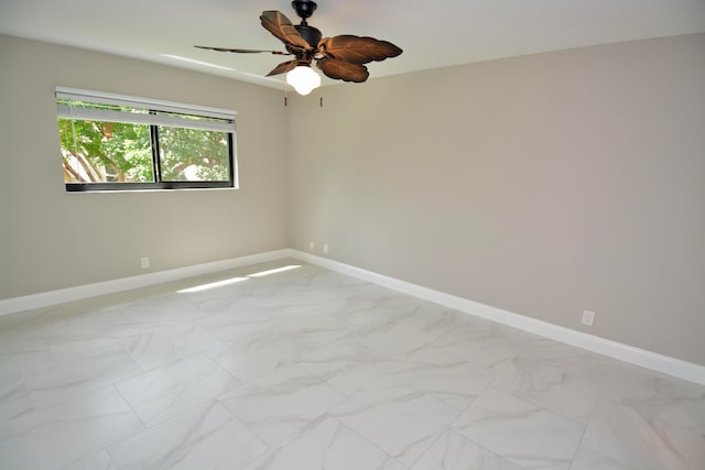 empty room featuring ceiling fan