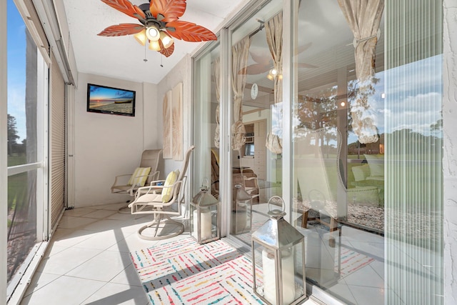 sunroom / solarium with ceiling fan