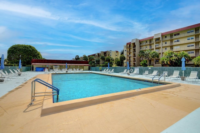 view of swimming pool featuring a patio