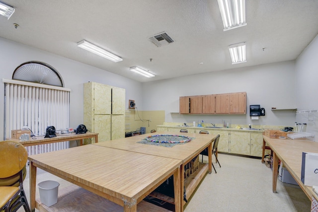 kitchen with a textured ceiling