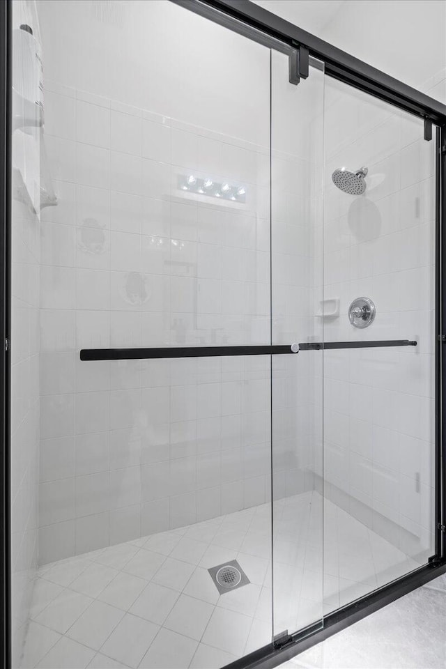 bathroom with an enclosed shower