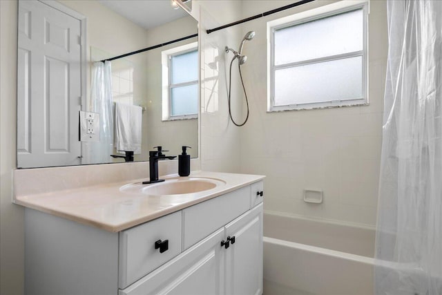 bathroom with vanity, a wealth of natural light, and shower / bath combination with curtain