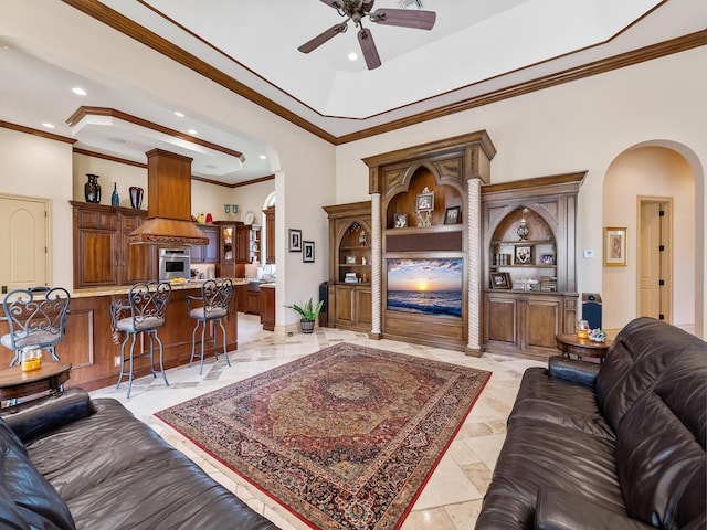 rec room featuring pool table, a high ceiling, indoor bar, light tile patterned flooring, and ornamental molding