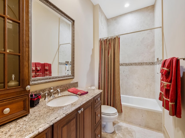 clothes washing area with light tile patterned flooring, washing machine and dryer, and cabinets