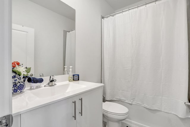 full bathroom with vanity, toilet, and shower / bath combination with curtain