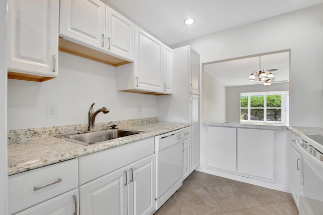 kitchen with white cabinetry, light tile patterned flooring, sink, dishwasher, and stove