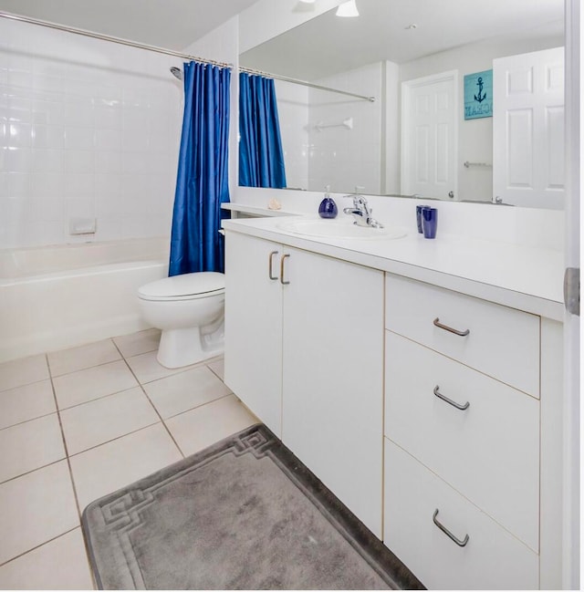 full bathroom featuring tile patterned floors, vanity, shower / bath combo, and toilet