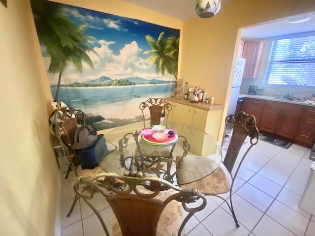 dining room with light tile floors