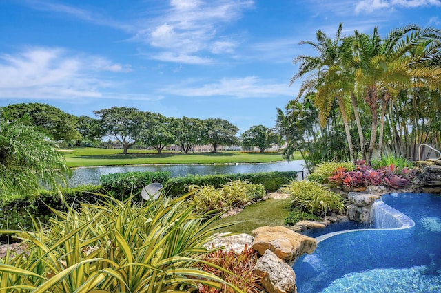 view of pool featuring a water view