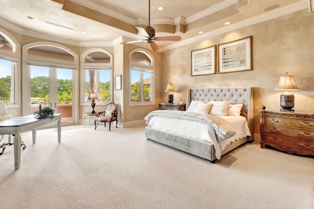 bedroom featuring carpet flooring, crown molding, and ceiling fan