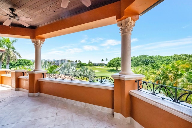 view of patio / terrace featuring a balcony and ceiling fan