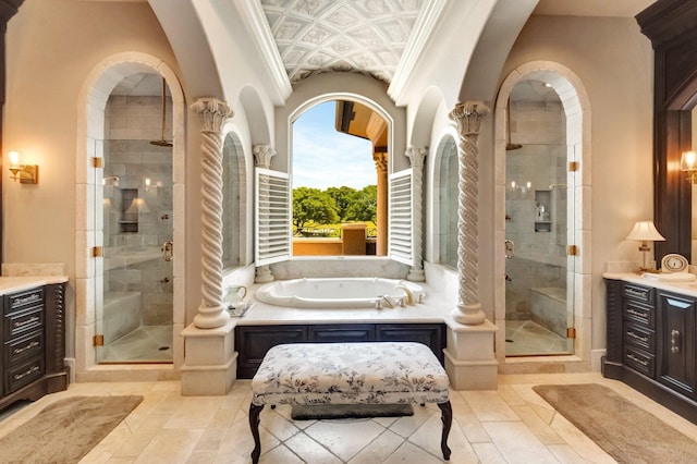 bathroom with vanity, an enclosed shower, and crown molding