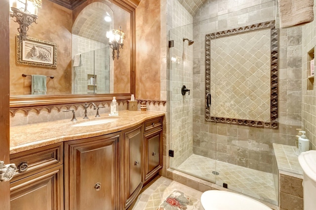 bathroom with vanity and an enclosed shower