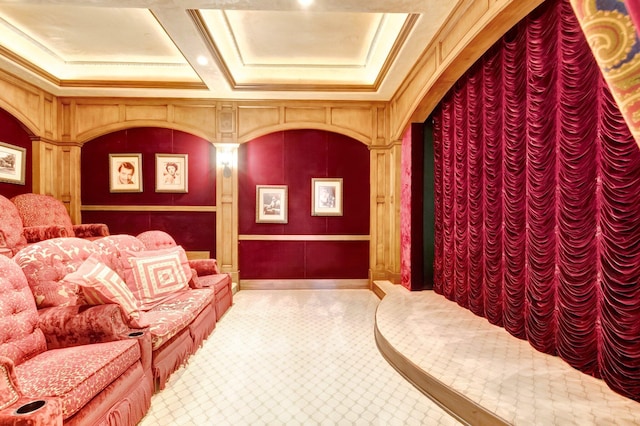 cinema room with beam ceiling, decorative columns, and coffered ceiling