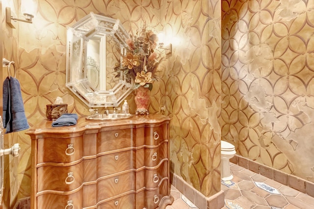 bathroom featuring sink and tile patterned flooring