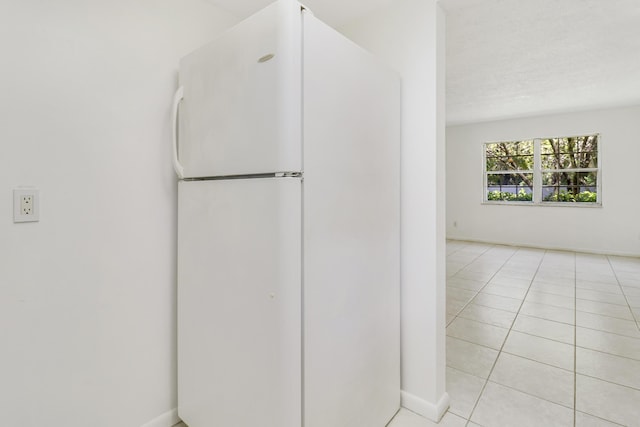 bathroom with tile patterned floors