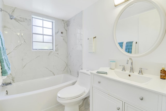 full bathroom with vanity, toilet, and tiled shower / bath combo