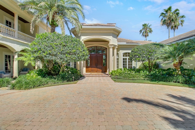 doorway to property featuring a balcony