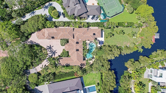 birds eye view of property featuring a water view