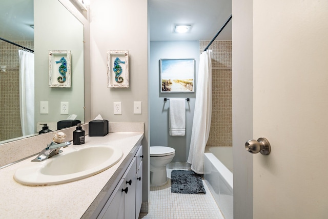 full bathroom featuring tile patterned floors, shower / tub combo with curtain, vanity, and toilet