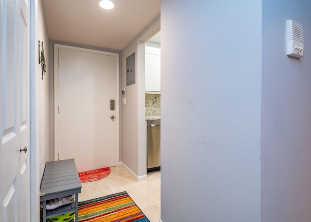 hall featuring light tile patterned flooring