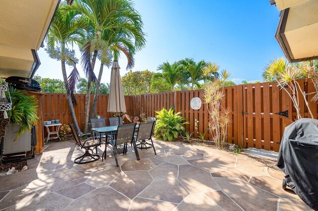 view of patio with a grill