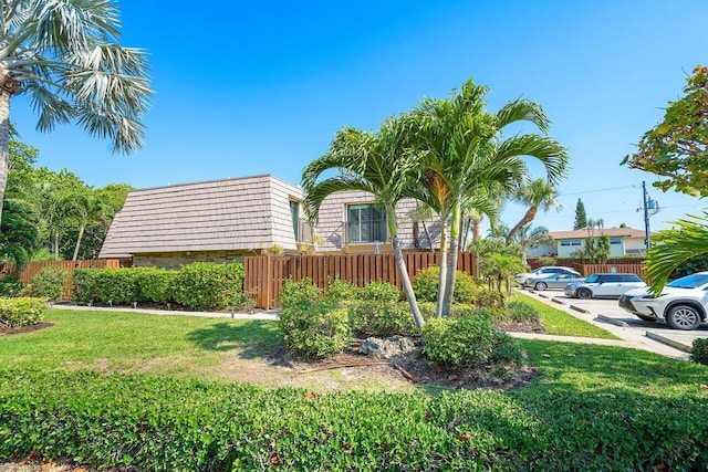 exterior space with a fenced front yard