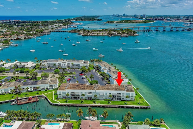 birds eye view of property featuring a water view