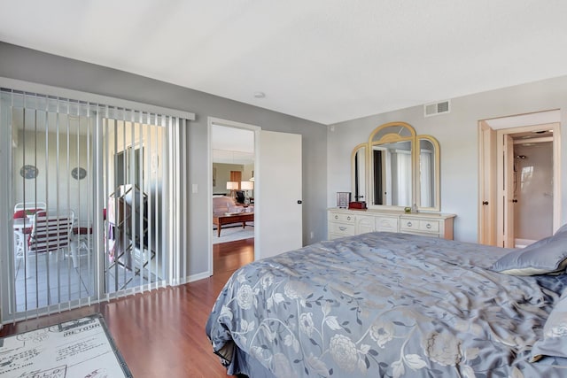 bedroom with hardwood / wood-style flooring