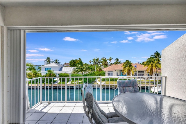 balcony featuring a water view