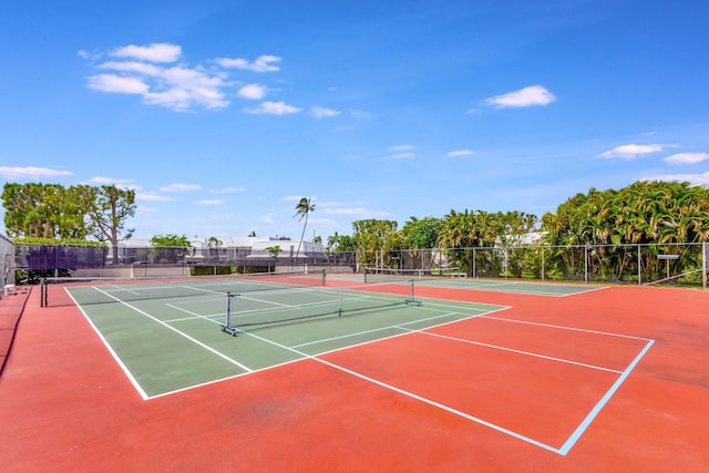 view of sport court with basketball hoop