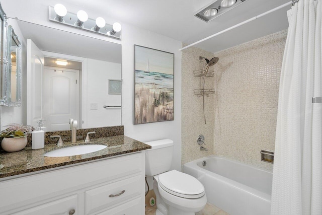 full bathroom with shower / tub combo with curtain, vanity, and toilet