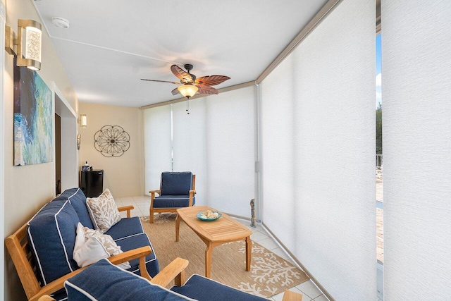 tiled living room featuring ceiling fan