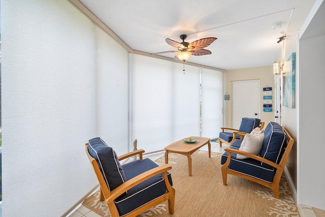 living area featuring ceiling fan