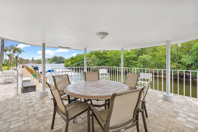 view of patio / terrace with a water view