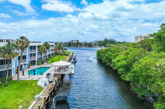 exterior space with a yard and a water view