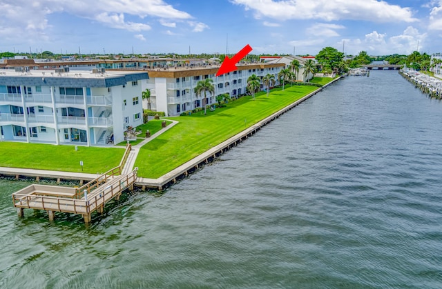 drone / aerial view with a water view