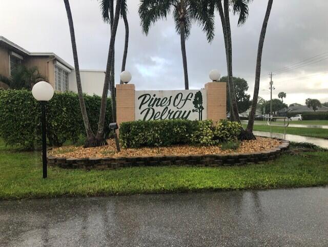 2541 Red Hibiscus Blvd Unit 31-B, Delray Beach, FL 33445 - view of community / neighborhood sign