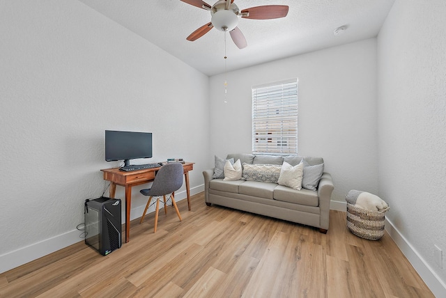 interior space with ceiling fan and light hardwood / wood-style floors