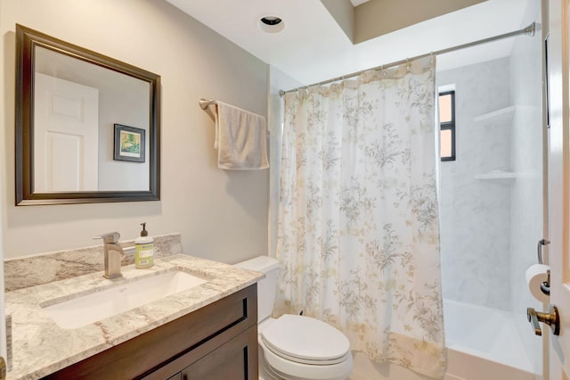 full bathroom with shower / bathtub combination with curtain, vanity, and toilet