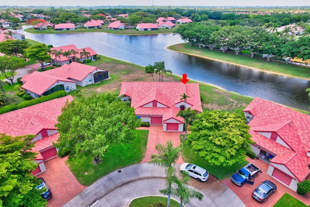 bird's eye view with a water view