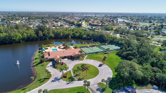 birds eye view of property featuring a water view