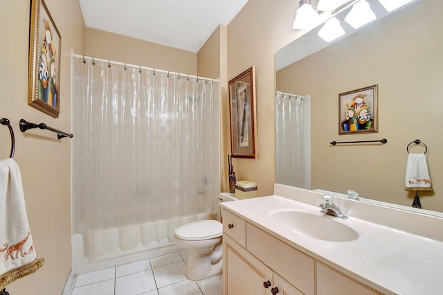 full bathroom featuring toilet, shower / bath combo with shower curtain, a skylight, vanity, and tile patterned floors