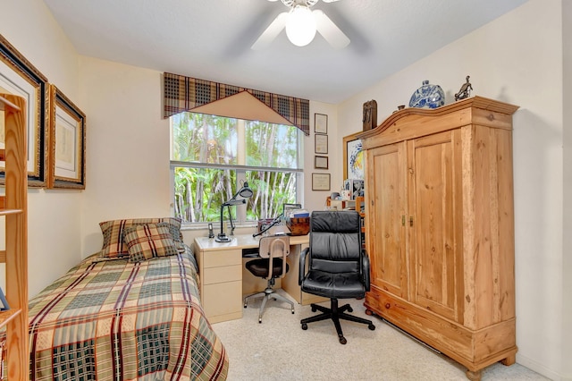 carpeted bedroom with ceiling fan